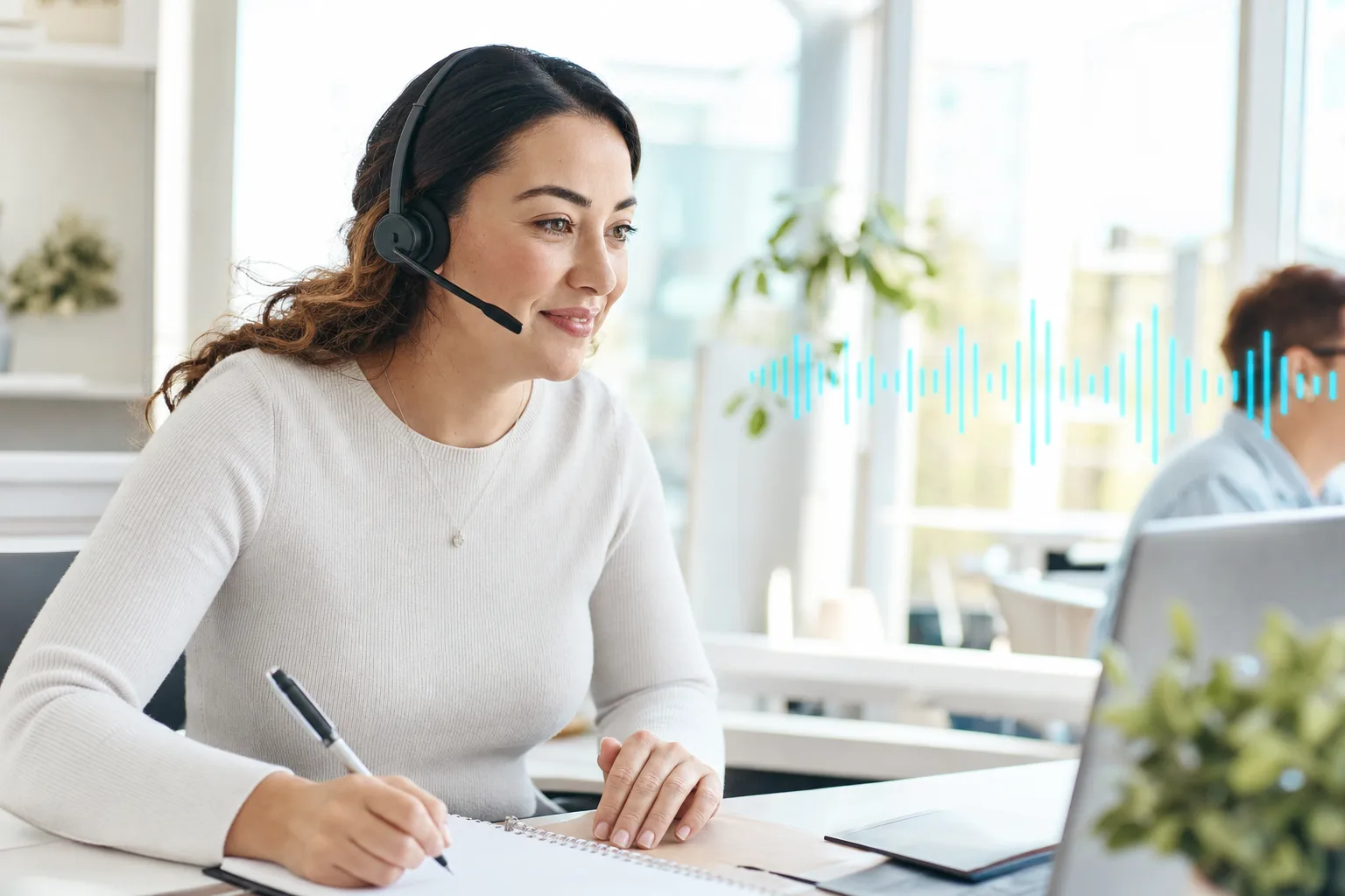 A human admissions rep taking a warm-handed-off call